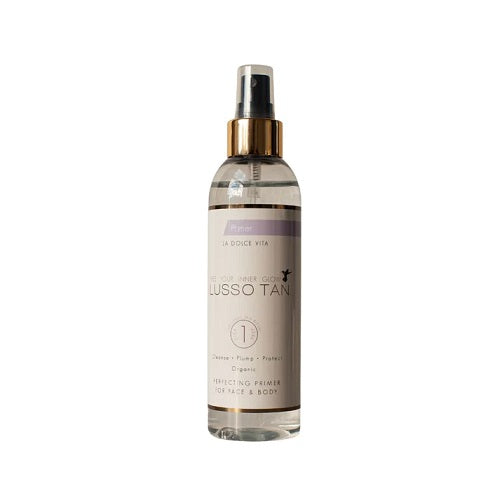 Lusso Tan primer spray bottle on a white background