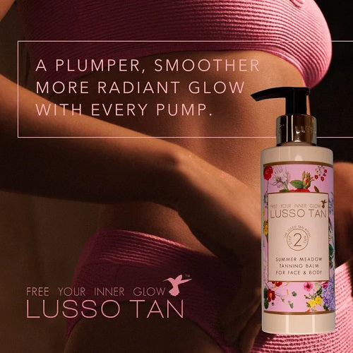 Lusso Tan summer meadows tanning balm bottle with promotional text on a blurred background