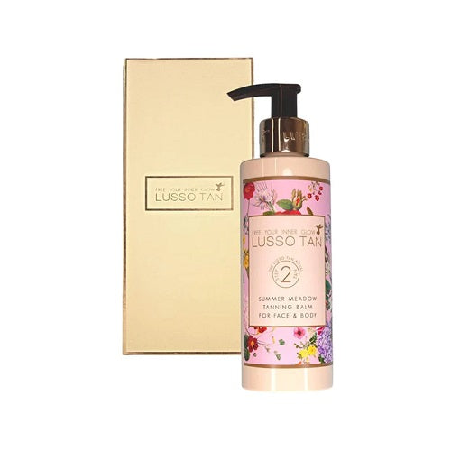 Lusso Tan summer meadows tanning balm with floral design on a white background