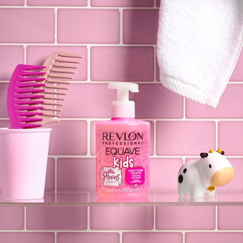 Revlon Equave Kids shampoo bottle on a pink tiled shelf with combs and a cow figurine.