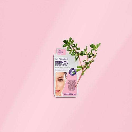 Skin Republic Retinol Infusion Sheet Face Mask with plant and pink background