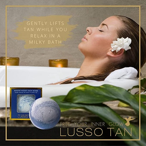 Woman relaxing in a bathtub with Lusso Tan Removing Bath Bomb, featuring text about tanning and relaxation.